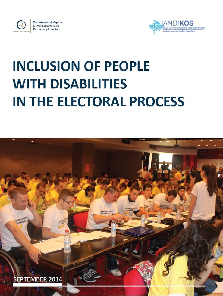 Persons with disabilities sit in a conference hall